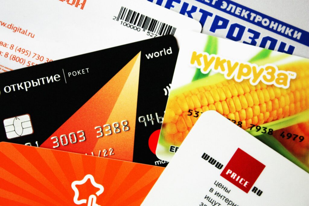 A mix of various credit and gift cards, showcasing a close-up view.